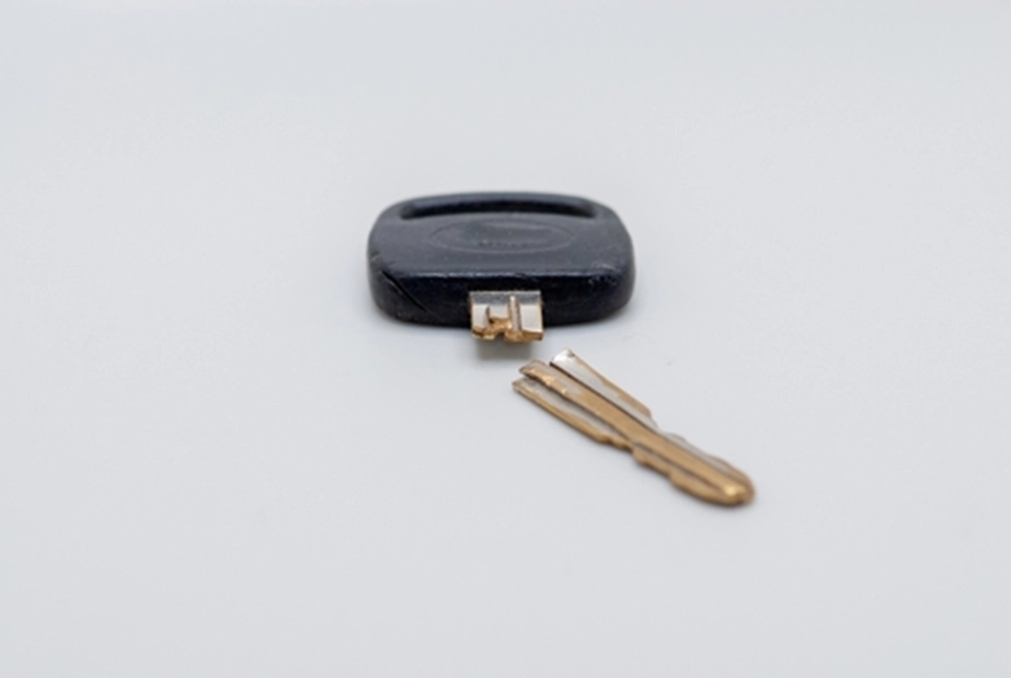 Snapped key on a white table