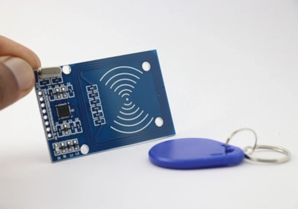 electronic tag and a gadget on a white surface